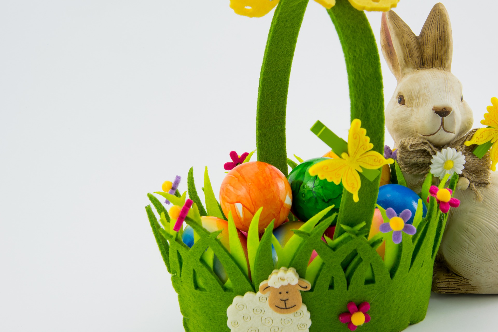 An easter basket themed with grass and a bunny